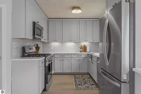 Kitchen - 7481 E Lincoln Rd, Cedar, MI 49621 photo 4 of 7