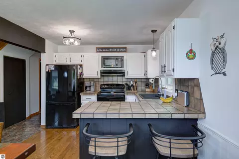 Kitchen - 8224 S Schomberg Rd, Cedar, MI 49621 photo 2 of 3