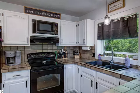Kitchen - 8224 S Schomberg Rd, Cedar, MI 49621 photo 3 of 3