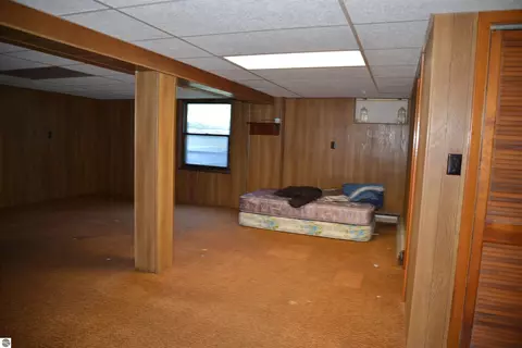 Bedroom - 114 W Second St, Elk Rapids, MI 49629 photo 5 of 9