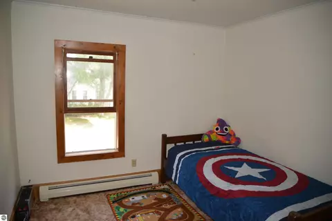 Bedroom - 114 W Second St, Elk Rapids, MI 49629 photo 8 of 9