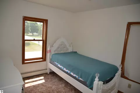 Bedroom - 114 W Second St, Elk Rapids, MI 49629 photo 6 of 9