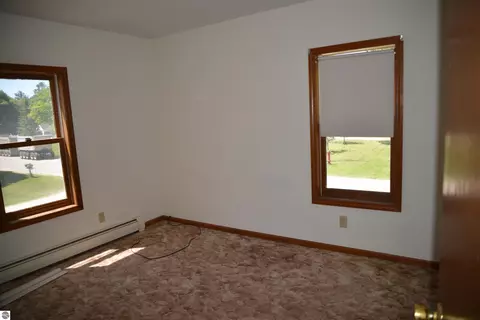 Bedroom - 114 W Second St, Elk Rapids, MI 49629 photo 4 of 9