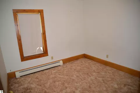 Bedroom - 114 W Second St, Elk Rapids, MI 49629 photo 2 of 9