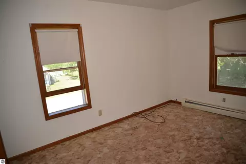 Bedroom - 114 W Second St, Elk Rapids, MI 49629 photo 3 of 9