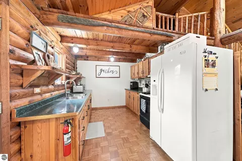 Kitchen - 2085 E Mannsiding Rd, Harrison, MI 48625 photo 3 of 5