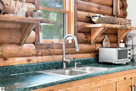 Kitchen - 2085 E Mannsiding Rd, Harrison, MI 48625 photo 4 of 5