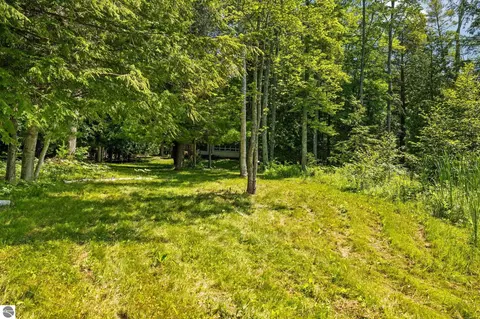 Exterior - 10000 Harmony Dr, Interlochen, MI 49643 photo 2 of 18