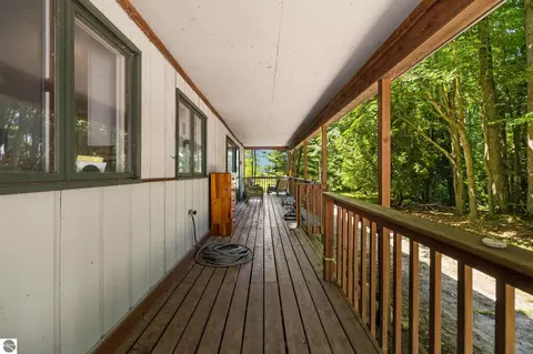 Exterior - 10000 Harmony Dr, Interlochen, MI 49643 photo 13 of 18