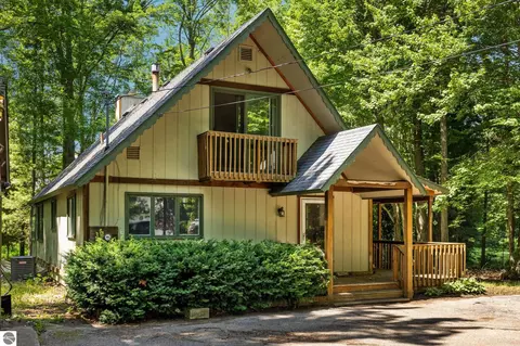 Exterior - 10000 Harmony Dr, Interlochen, MI 49643 photo 5 of 18