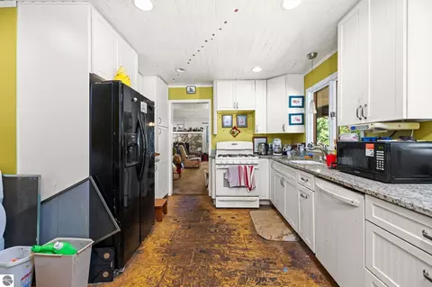 Kitchen - 10000 Harmony Dr, Interlochen, MI 49643 photo 2 of 3