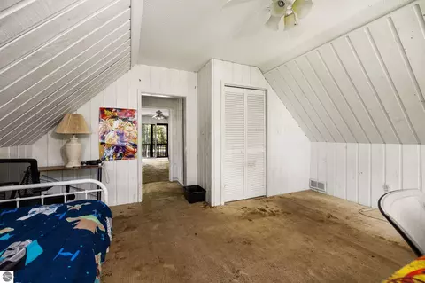 Bedroom - 10000 Harmony Dr, Interlochen, MI 49643 photo 2 of 3