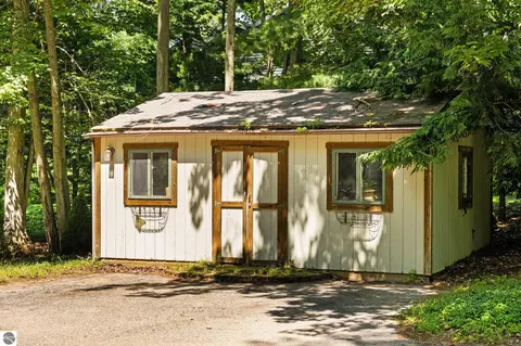 Exterior - 10000 Harmony Dr, Interlochen, MI 49643 photo 9 of 18