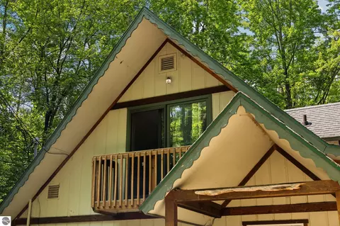 Exterior - 10000 Harmony Dr, Interlochen, MI 49643 photo 8 of 18