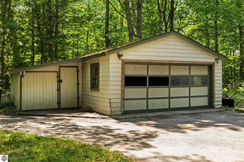 Exterior - 10000 Harmony Dr, Interlochen, MI 49643 photo 7 of 18