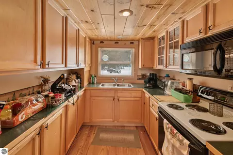 Kitchen - 1133 W Thumb Lake Rd, Vanderbilt, MI 49795 photo 3 of 4