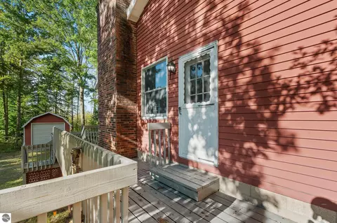 Exterior - 10076 Harmony Dr, Interlochen, MI 49643 photo 5 of 6