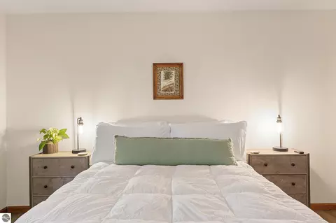 Bedroom - 10076 Harmony Dr, Interlochen, MI 49643 photo 2 of 6
