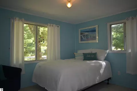 Bedroom - 1828 Outer Dr, Interlochen, MI 49643 photo 8 of 9