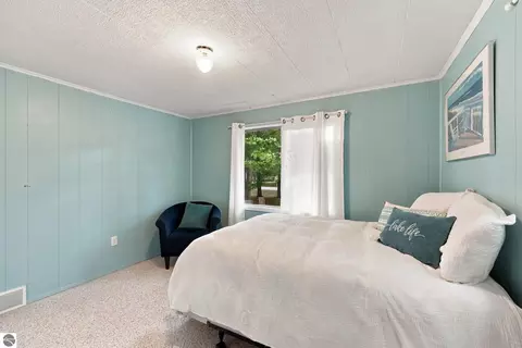Bedroom - 1828 Outer Dr, Interlochen, MI 49643 photo 6 of 9