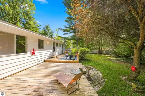 Exterior - 1828 Outer Dr, Interlochen, MI 49643 photo 3 of 15