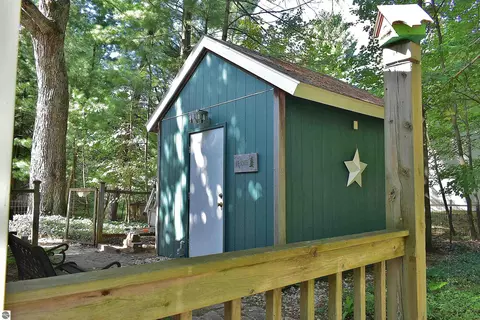 Exterior - 1828 Outer Dr, Interlochen, MI 49643 photo 9 of 15
