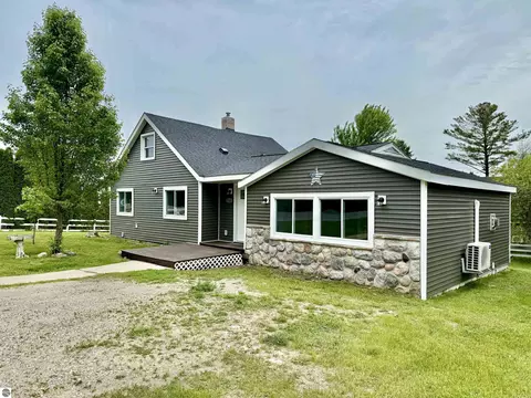 7160 Cherry Ave, Kewadin, MI 49648