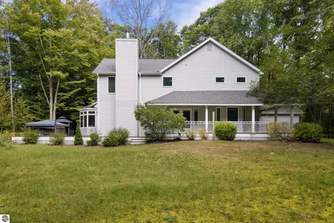 Exterior - 151 Dubonnet Trl, Interlochen, MI 49643 photo 4 of 9