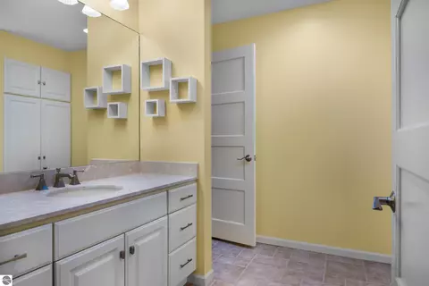 Bath - 151 Dubonnet Trl, Interlochen, MI 49643 photo 1 of 7