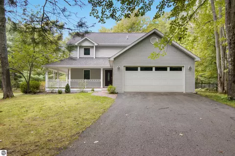 Exterior - 151 Dubonnet Trl, Interlochen, MI 49643 photo 3 of 9