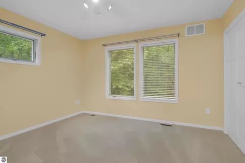 Bedroom - 151 Dubonnet Trl, Interlochen, MI 49643 photo 6 of 8