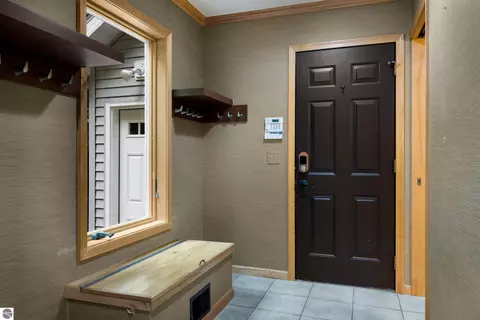 Entry Way - 151 Dubonnet Trl, Interlochen, MI 49643 photo 2 of 3