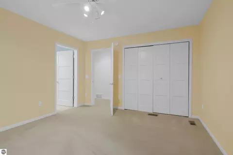 Bedroom - 151 Dubonnet Trl, Interlochen, MI 49643 photo 5 of 8