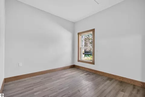 Bedroom - 9722 Fourth St, Interlochen, MI 49643 photo 4 of 6