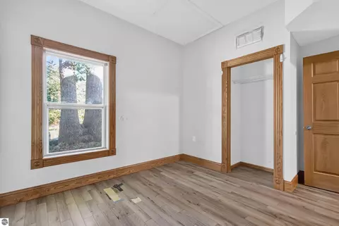 Bedroom - 9722 Fourth St, Interlochen, MI 49643 photo 5 of 6