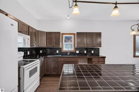 Kitchen - 9722 Fourth St, Interlochen, MI 49643 photo 5 of 6