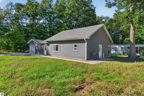Exterior - 9722 Fourth St, Interlochen, MI 49643 photo 3 of 5