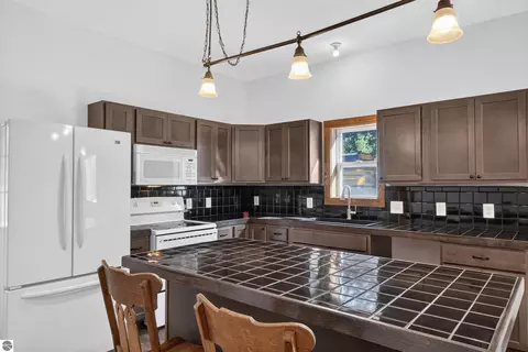 Kitchen - 9722 Fourth St, Interlochen, MI 49643 photo 2 of 6
