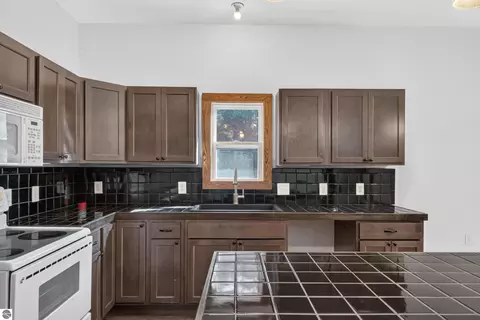 Kitchen - 9722 Fourth St, Interlochen, MI 49643 photo 1 of 6