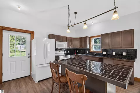 Kitchen - 9722 Fourth St, Interlochen, MI 49643 photo 3 of 6