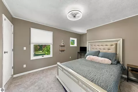 Bedroom - 707 Pine St, Elk Rapids, MI 49629 photo 6 of 10