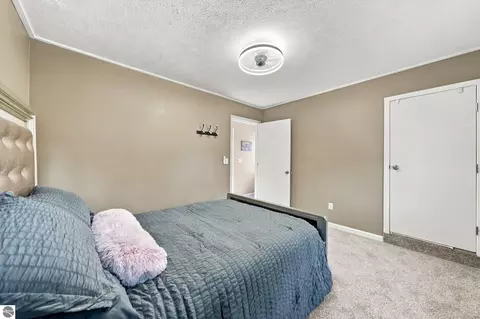 Bedroom - 707 Pine St, Elk Rapids, MI 49629 photo 7 of 10