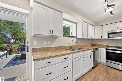 Kitchen - 707 Pine St, Elk Rapids, MI 49629 photo 1 of 4