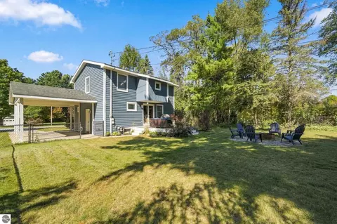 Exterior - 707 Pine St, Elk Rapids, MI 49629 photo 9 of 11