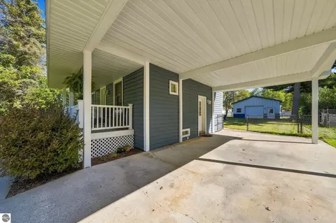 Exterior - 707 Pine St, Elk Rapids, MI 49629 photo 4 of 11