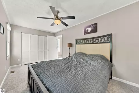 Bedroom - 707 Pine St, Elk Rapids, MI 49629 photo 4 of 10
