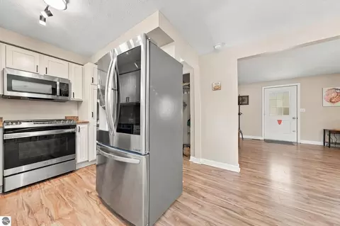 Kitchen - 707 Pine St, Elk Rapids, MI 49629 photo 3 of 4