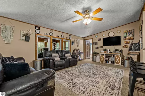 Living - 4812 SE County Line Rd, Shepherd, MI 48883 photo 1 of 1