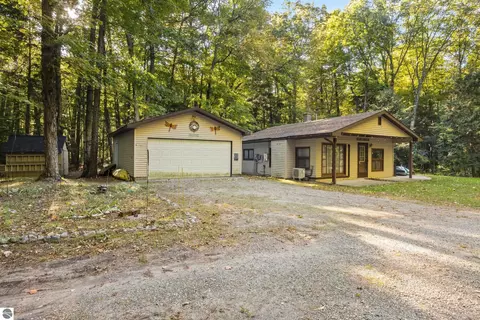 Exterior - 8702 Deadstream Rd, Honor, MI 49640 photo 6 of 10