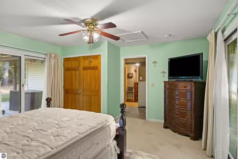 Bedroom - 8702 Deadstream Rd, Honor, MI 49640 photo 2 of 5